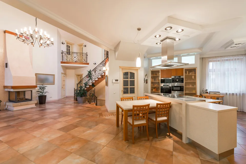 Tile flooring through a large open kitchen